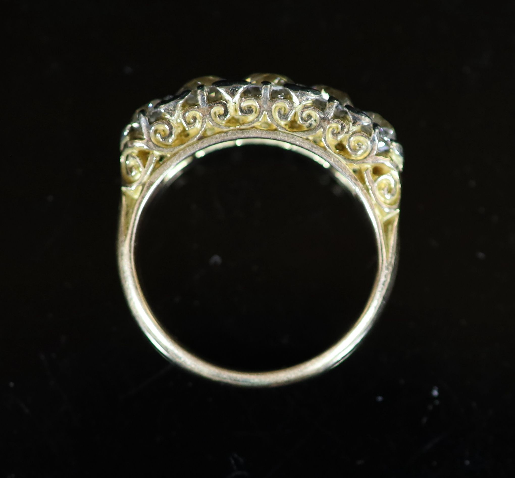 An early 20th century 18ct gold and graduated five stone diamond ring